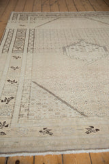 Distressed vintage Sivas carpet field showing even wear, stepped medallion, and Herati motifs.