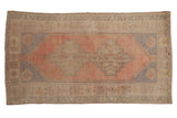 Vintage Distressed Oushak rug with dusty blush and pale slate gray geometric double medallion.