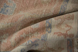 Distressed Oushak carpet pile in blush, ivory, dusty blue with even wear.