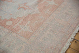 Vintage Distressed Oushak pile texture with mostly even wear, pale blush and powder blue details.