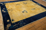 Fully secured side cord selvage on a vintage Peking carpet with indigo floral border.