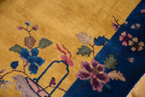Detailed Art Deco rug with saffron yellow field, cobalt blue, and mauve florals.