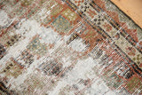 Distressed vintage Malayer runner detail, with worn pile in copper, silver, powder blue.