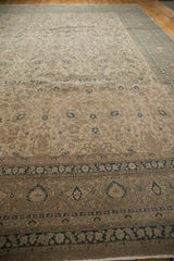 Distressed vintage Sivas carpet border with muted indigo blue motifs and soft coffee brown vinery.