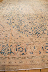 Vintage Mahal rug detail: Herati motif field and samovar border in antique ivory, blue, and coffee tones.