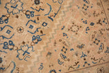 Vintage Mahal carpet Herati motif in beige, sky blue, and brown, with faint foundation visible.