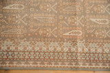 Distressed Sivas carpet: geometric borders, boteh field in oxidized silver, dusty terra cotta.