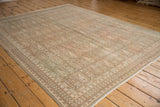 Distressed Sivas carpet, intact side selvage borders time-softened boteh and floral motifs.