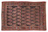 Vintage hand-knotted Senneh rug, navy field, allover oversized red and blue boteh design.