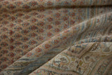 Distressed vintage Mir Sarouk carpet with allover boteh pattern, abrashed texture, and intricate border.