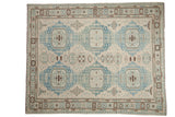 Afghani Soumac carpet, geometric repeating powder blue medallions on an ivory field with brown accents, 7'1