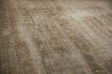 Textured pile of vintage Sparta carpet with mostly even wear and faded dusty sage floral motif.