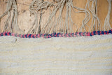 Vintage Turkish rag rug with braided pink, blue selvage and natural ivory fringe.