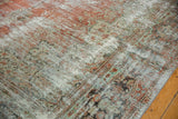 Detail of distressed Mahal carpet, showing isolated foundation, faded terra cotta and seafoam hues.