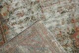 Vintage distressed Mahal carpet corner, showing ornate floral pile, hand-knotted foundation, and side selvage.