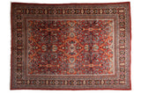 Vintage Persian Mahal carpet, brick red field, shadow medallion, ornate botanical pattern. 9'2