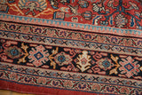 Stacked borders with floral, X, and geometric patterns in brick red, navy, and blush tones.
