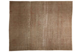 Distressed vintage Sivas carpet featuring oxidized silver and earthen tones, with subtle pattern texture.