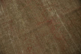 Distressed vintage Sivas carpet showing textural pile and visible foundation.