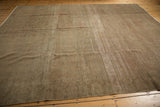 Sivas carpet's distressed texture featuring subtle abrashes, earthen and oxidized silver tones.