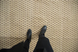Vintage distressed Turkish Sivas carpet: ivory and dark beige diminutive boteh pattern in staggered rows.