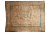 Distressed vintage Tabriz carpet with central starburst medallion, sky blue and beige floral field, 9'9