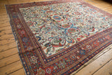 Vintage Mahal carpet: ivory field with colorful floral vinery and classic Samovar main border.