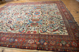Intricate madder root red Samovar border of a vintage Mahal with indigo and ivory field.