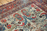 Vintage Mahal carpet: ivory field with oversized red lotus, blue vinery, Samovar border.