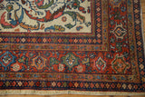 Vintage Mahal carpet corner, madder red Samovar border, ivory field, lush vinery, lightly tattered fringe.