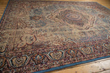 Detailed floral border and field of vintage Malayer rug in denim blue, beige, blush.