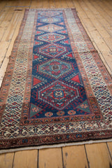 Side border of vintage Northwest Persian runner, with intricate hook-and-latch motifs.
