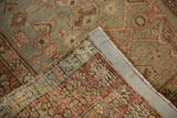 Distressed Heriz runner showing Herati motif on worn pile and hand-knotted foundation.