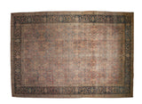 Vintage distressed Tabriz carpet with an intricate allover pattern in blush, raspberry, and dusty blue.
