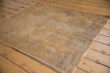 Distressed Afshar rug detail revealing threadbare areas and underlying foundation.