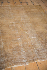 Distressed vintage Afshar rug with threadbare texture showing visible foundation.