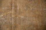 Exposed foundation of a vintage Afshar rug, showing holed regions and weave.