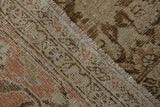 Hand-knotted foundation and low pile texture of a distressed vintage Tabriz carpet.