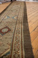 Distressed Serab runner, intricate geometric medallion design with ivory, red, and blue.