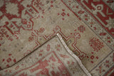 Detail of the folded corner on a vintage Karaja rug, showing the back weave and low, even pile.