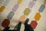 Afghani Kilim carpet with abstract pebble pattern, ivory field, colorful abrashes.