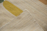 Detail of hand woven Afghani Kilim, showing yellow pebble design, flatweave, and intact side cord.