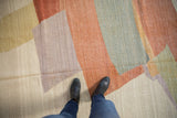 Hand woven Afghani Kilim with abstract shapes and abrashes in ivory, lavender, silver.