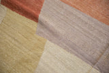 Textured abstract kilim weave with strong abrashes in ivory, lavender, and madder red.