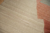 Hand-woven Afghani Kilim texture with abstract ivory, pale brick red blocks and abrashes.