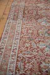 Evenly worn pile of a vintage Karaja runner, showing the geometric border and brick red field.