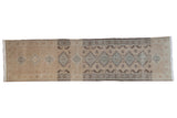 Distressed Serab runner rug with repeating diamond medallions, in beige, ivory, and dusty teal, 2'7