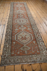 Distressed fringe and geometric border of a vintage Northwest Persian runner.