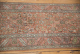 Antique Distressed Bakshaish rug with Herati motif, worn pile, foundation showing, and blush abrashes.