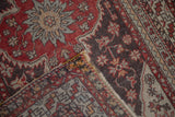 Corner of a vintage Anatolian rug runner folded to reveal its dense, hand-knotted foundation.